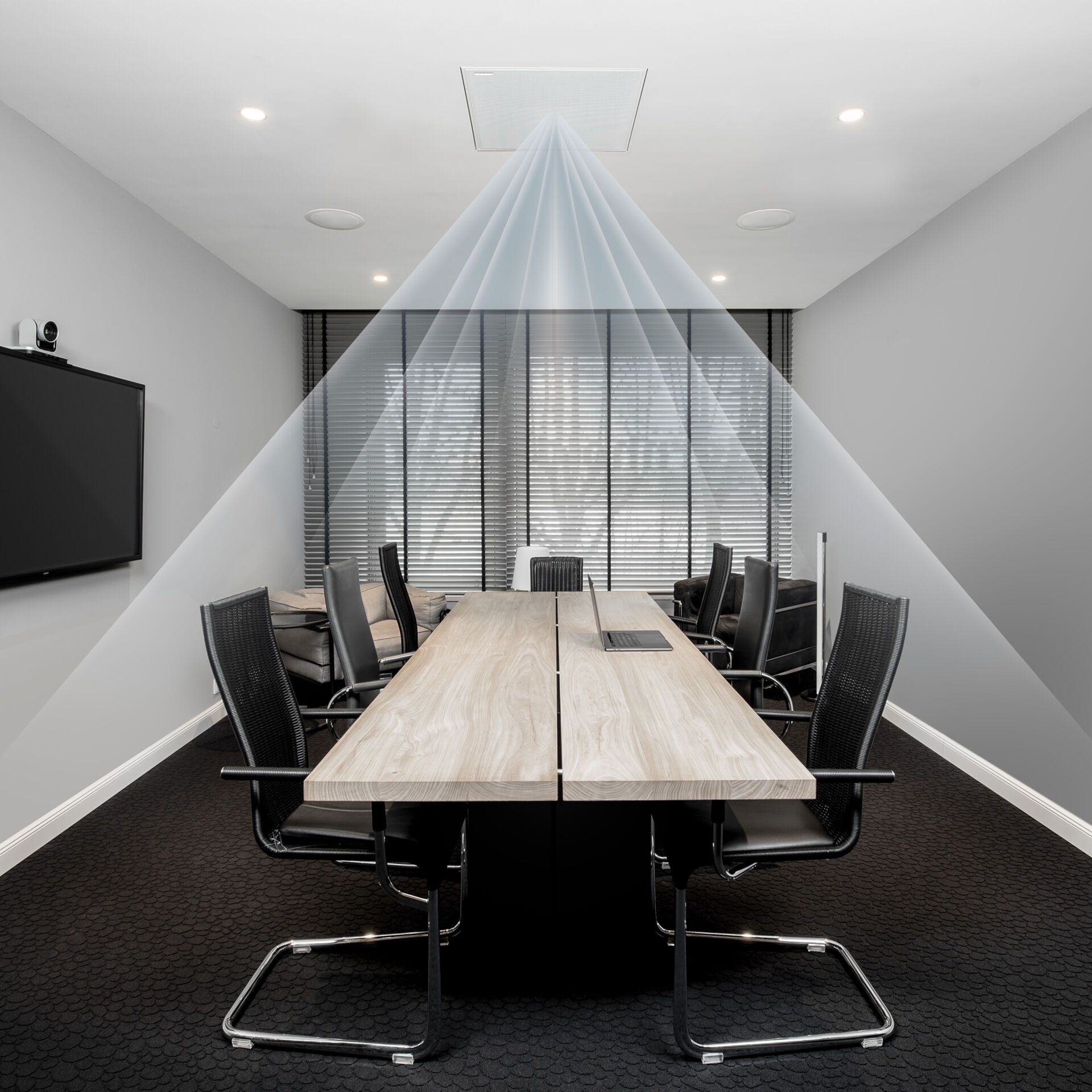 Salle de réunion équipée d'un système audio de plafond